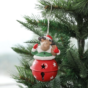 Cartoon reindeer Christmas bell hanging on a pine tree branch with a festive holiday vibe