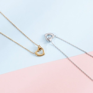 Hollow heart stainless steel necklaces in gold and silver finish with zircon accents