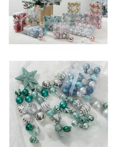 Macro detail of assorted Christmas ornaments in various finishes with a star tree topper