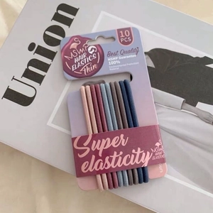 Detail of 10 pack colorful seamless elastic hair ties on display card with Morandi tones
