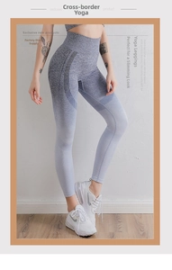 Detail of high waisted seamless yoga pants with grey gradient and vertical stripes