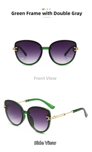 Detail view of emerald green cat eye sunglasses with gold temples and gradient lenses