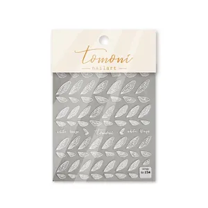 5D Japanese style white wing nail art stickers with delicate 3D relief patterns on grey card