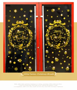 Gold glitzernde Weihnachtsaufkleber mit Kranz, Schneeflocken und Sternen für Fensterglas