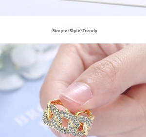 Close-up of gold chain ring with micro-pave white zircons for women fashion