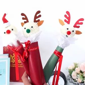 DIY Christmas bouquet kit with plush Santa and reindeer pom-pom decorations