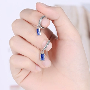 Elegant silver leverback earrings with navy blue rectangular gems and small zircon crystals