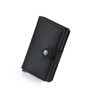 Detailed view of black PU leather pop-up card holder with metal snap closure mechanism