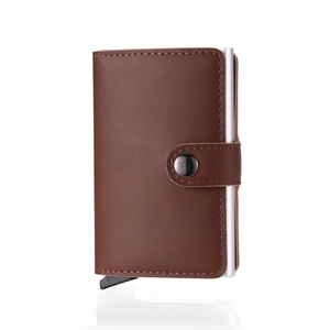 Close-up of brown PU leather card holder with aluminum pop-up mechanism and metal snap button
