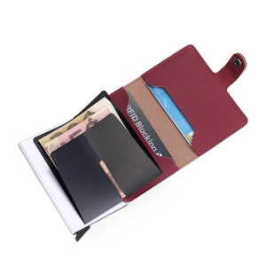 Detail view of red PU leather RFID blocking wallet with silver aluminum pop-up card holder
