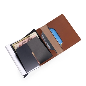 Detail of slim RFID blocking wallet with brown leather and silver aluminum card slots