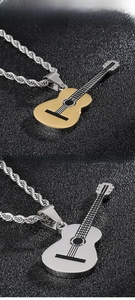 Detail of guitar shaped necklaces in gold and silver finish with twisted rope chains