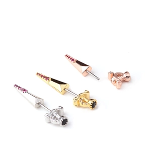 Three surgical steel cartilage earrings in silver, gold, and rose gold with pink zircon