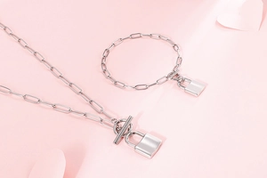 Silver stainless steel OT buckle necklace and bracelet set with lock pendants on pink
