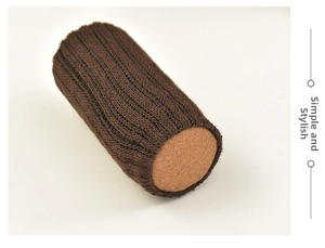 Detail of dark brown knitted chair leg cover with durable vertical ribbing texture