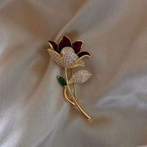Elegant tulip flower brooch with red enamel, sparkling zircons and a white pearl accent