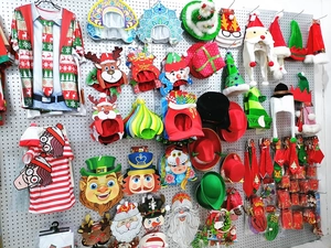 Retail shelf display showing various Christmas and St. Patrick's Day party accessories