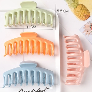 Detailed size view of 11cm large plastic hair claws in green, orange, blue, and pink colors