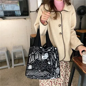 Detailed shot of canvas tote bag with black and white abstract wave pattern illustration