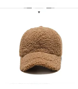 Front view of a brown plush lamb wool baseball cap showing thick warm winter texture