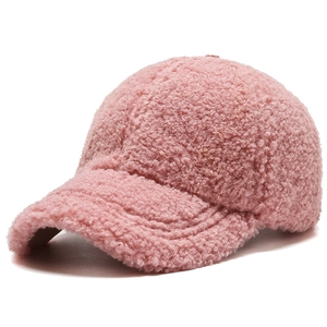 Pink sherpa fleece baseball cap for women with thick teddy fur texture and warm design