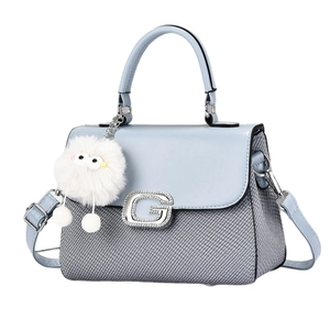 Blue and grey contrast crossbody bag with crystal G buckle and plush monster charm