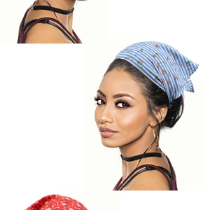 Detail showing blue striped floral and red floral headscarf patterns on lightweight fabric