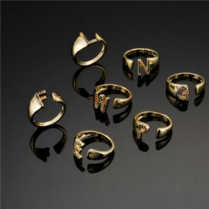 Set of seven 18K gold plated open rings with colorful micro-inlaid letter charms