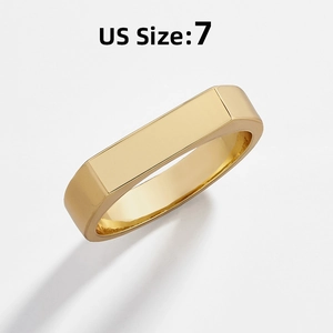 Polished gold rectangular ring detail showing US size 7 on a clean white background