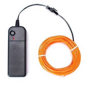 Detail of 3M orange EL wire kit with black battery pack for costume and stage decoration