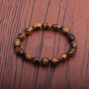 Handmade men's tiger eye beaded bracelet featuring natural brown oval stone beads