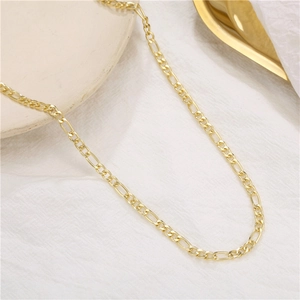 Classic gold Figaro chain necklace for men featuring interlocking links in a minimalist style