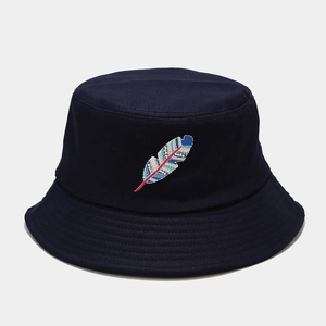 Close-up of navy blue cotton bucket hat with colorful embroidered feather pattern