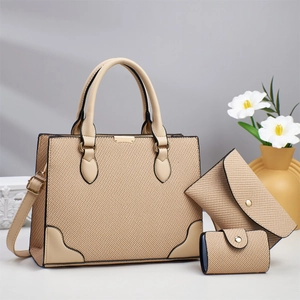 Three-piece women's tote set in textured weave pattern with shoulder strap and handles