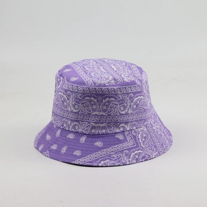 Detailed close-up of purple paisley patterned bucket hat with classic white bandana print