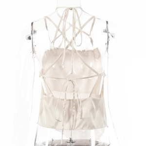 Detail of cross-tie back design on off-white satin summer top for women