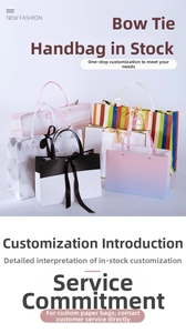 Detail of premium paper gift bags with decorative bow ribbons and sturdy rivet handles