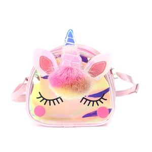 Close-up of holographic unicorn crossbody bag with glitter horn and rainbow pompom