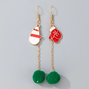 Detail view of festive Christmas earrings featuring snowman and red snowflake glove charms
