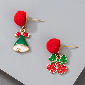 Detailed view of festive Christmas bell earrings with red pom-poms and colorful bows
