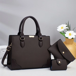 Three-piece dark brown textured tote set with crossbody strap and gold metal hardware