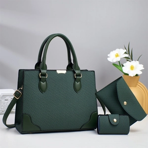 Deep green woven texture handbag set with tote, pouch, and wallet showing gold hardware