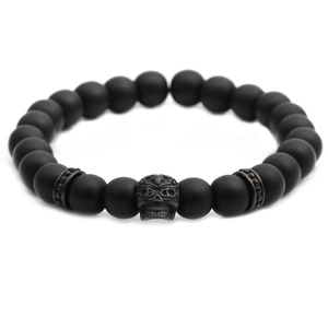 8mm black frosted stone bracelet featuring a vintage metal skull bead centerpiece