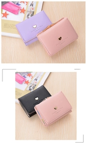Close-up of trifold PU leather wallets with gold heart clasp and Sweet Dream text