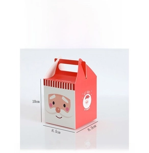Detailed view of red Christmas apple gift box with cartoon Santa Claus design and handle