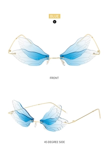 Macro view showing blue gradient dragonfly wing lenses and gold metal temples on sunglasses