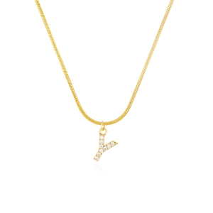 Detail of gold snake chain necklace featuring a crystal-encrusted letter Y pendant