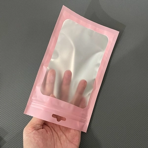 Pink matte foil ziplock pouch with a clear window and hanging hole for packaging
