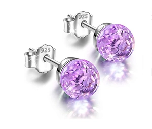 Close-up of S925 sterling silver studs featuring faceted purple crystal balls
