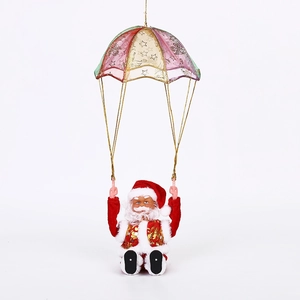 Black Santa Claus figurine with gold sequins on parachute Christmas ornament